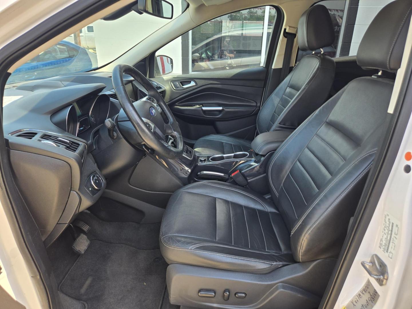 2014 WHITE Ford Escape Titanium FWD (1FMCU0J95EU) with an 2.0L L4 DOHC 16V engine, 6-Speed Automatic transmission, located at 503 West Court, Seguin, TX, 78155, (830) 379-3373, 29.568621, -97.969803 - 2014 Ford Escape Titanium FWD with a 2.0L L4 DOHC 16V, Automatic, Tilt, Cruise, AM/FM/CD Stereo, Power Windows, Locks, Seat and Side Mirrors, Bluetooth, Leather Seats, Tinted Windows, Dual Climate Control, Heated Seats, Power Rear Hatch, Alloy Wheels, Backup Camera, Bumper Sensors, Rear Wiper, Rear - Photo#4