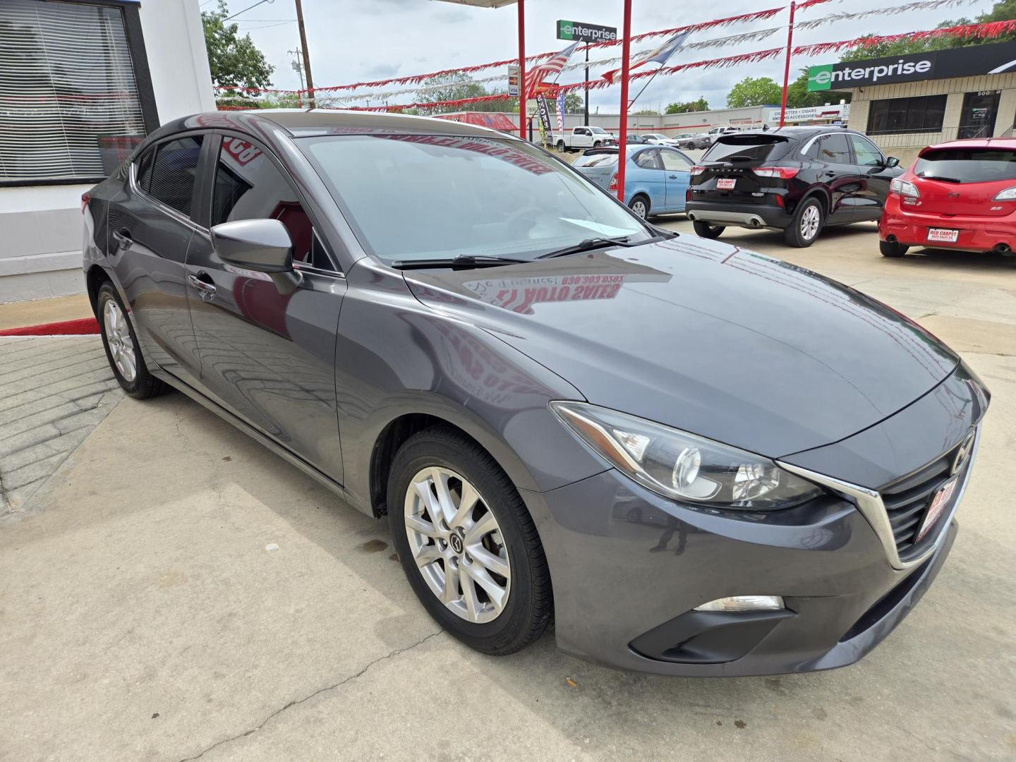 2016 Mazda MAZDA3 i Sport AT 4-Door (JM1BM1U74G1) with an 2.0L L4 DOHC 16V engine, Automatic transmission, located at 503 West Court, Seguin, TX, 78155, (830) 379-3373, 29.568621, -97.969803 - 2016 Mazda MAZDA3 i Sport AT 4-Door with a 2.0L L4 DOHC 16V, Automatic, Tilt, Cruise, AM/FM/AUX Stereo, Power Windows, Locks and Side Mirrors, Bluetooth, Tinted Windows, Backup Camera, Alloy Wheels, Rear Defroster and more!! - Photo#1