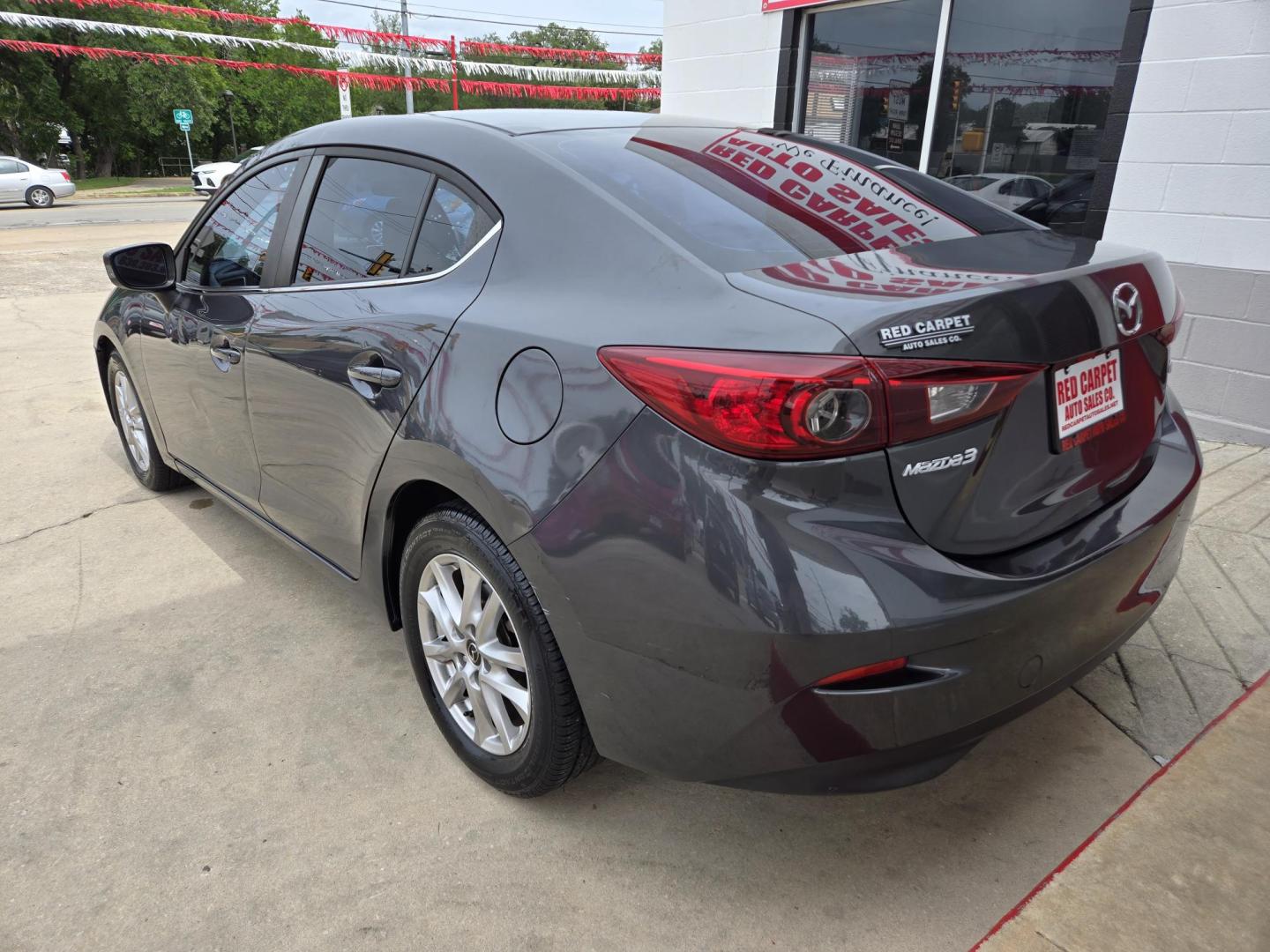 2016 Mazda MAZDA3 i Sport AT 4-Door (JM1BM1U74G1) with an 2.0L L4 DOHC 16V engine, Automatic transmission, located at 503 West Court, Seguin, TX, 78155, (830) 379-3373, 29.568621, -97.969803 - 2016 Mazda MAZDA3 i Sport AT 4-Door with a 2.0L L4 DOHC 16V, Automatic, Tilt, Cruise, AM/FM/AUX Stereo, Power Windows, Locks and Side Mirrors, Bluetooth, Tinted Windows, Backup Camera, Alloy Wheels, Rear Defroster and more!! - Photo#3