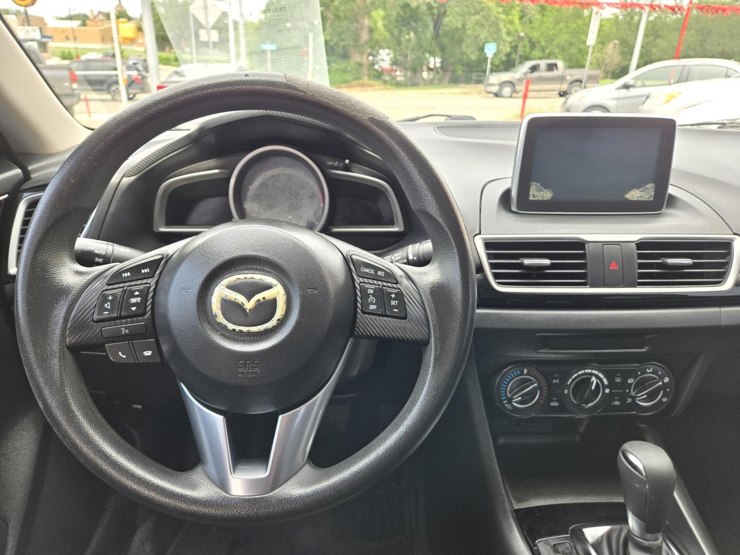 2016 Mazda MAZDA3 i Sport AT 4-Door (JM1BM1U74G1) with an 2.0L L4 DOHC 16V engine, Automatic transmission, located at 503 West Court, Seguin, TX, 78155, (830) 379-3373, 29.568621, -97.969803 - 2016 Mazda MAZDA3 i Sport AT 4-Door with a 2.0L L4 DOHC 16V, Automatic, Tilt, Cruise, AM/FM/AUX Stereo, Power Windows, Locks and Side Mirrors, Bluetooth, Tinted Windows, Backup Camera, Alloy Wheels, Rear Defroster and more!! - Photo#5