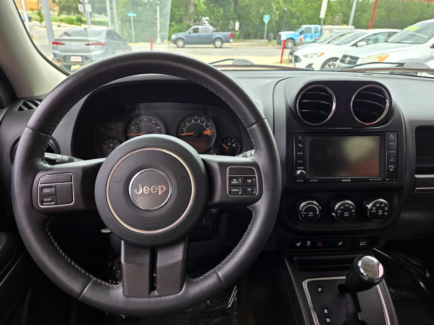 2016 Red Jeep Patriot Latitude 2WD (1C4NJPFB2GD) with an 2.4L L4 DOHC 16V engine, Automatic transmission, located at 503 West Court, Seguin, TX, 78155, (830) 379-3373, 29.568621, -97.969803 - 2016 Jeep Patriot Latitude 2WD with a 2.4L L4 DOHC 16V, Automatic, Tilt, Cruise, AM/FM/CD Touchscreen Stereo, Power Windows, Locks and Side Mirrors, Bluetooth, Navigation, Heated Seats, Alloy Wheels, Rear Wiper, Rear Defroster and more!! - Photo#5