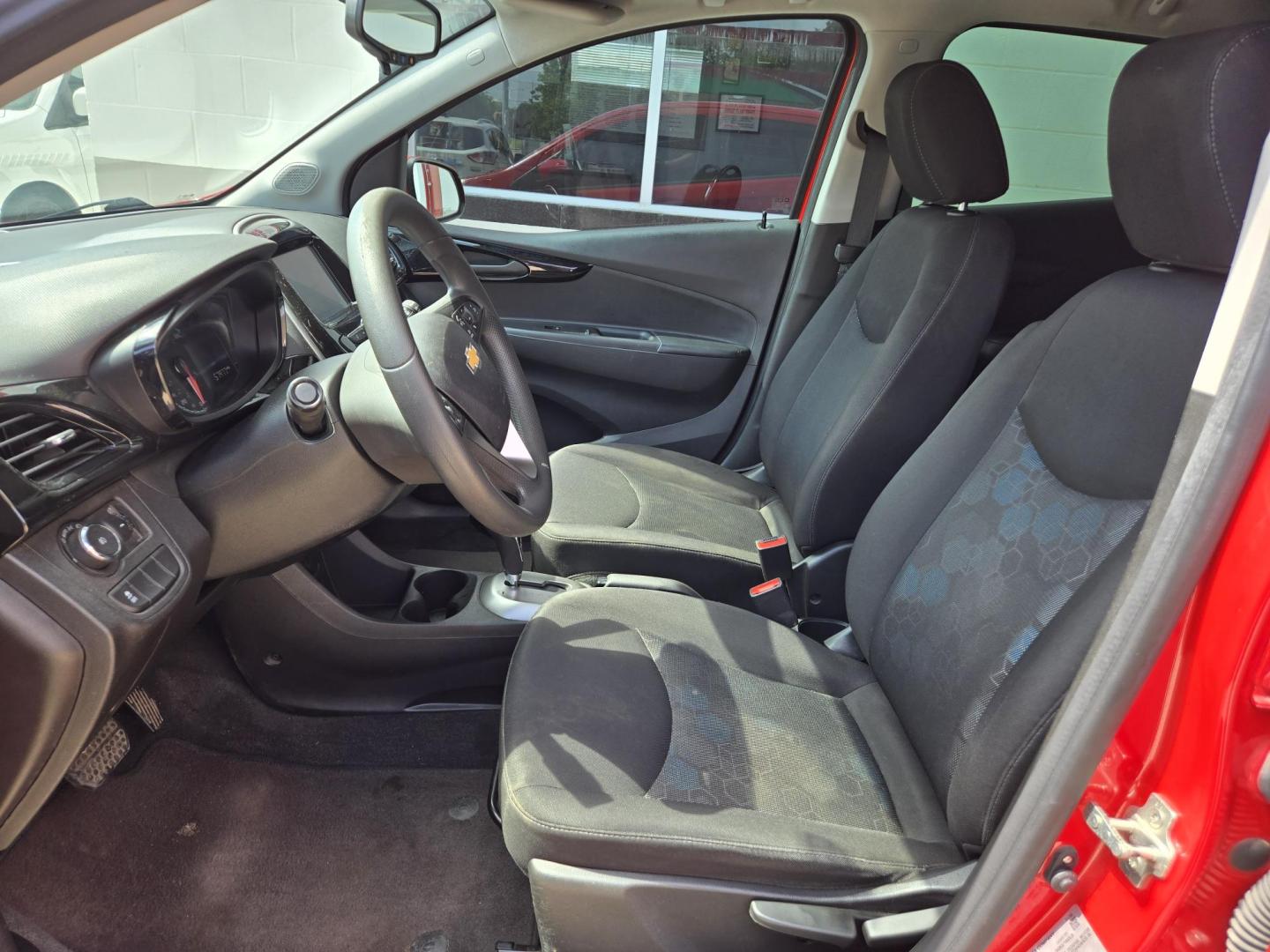 2016 Red Chevrolet Spark 1LT CVT (KL8CD6SA8GC) with an 1.4L L4 16V DOHC engine, CVT transmission, located at 503 West Court, Seguin, TX, 78155, (830) 379-3373, 29.568621, -97.969803 - Photo#4