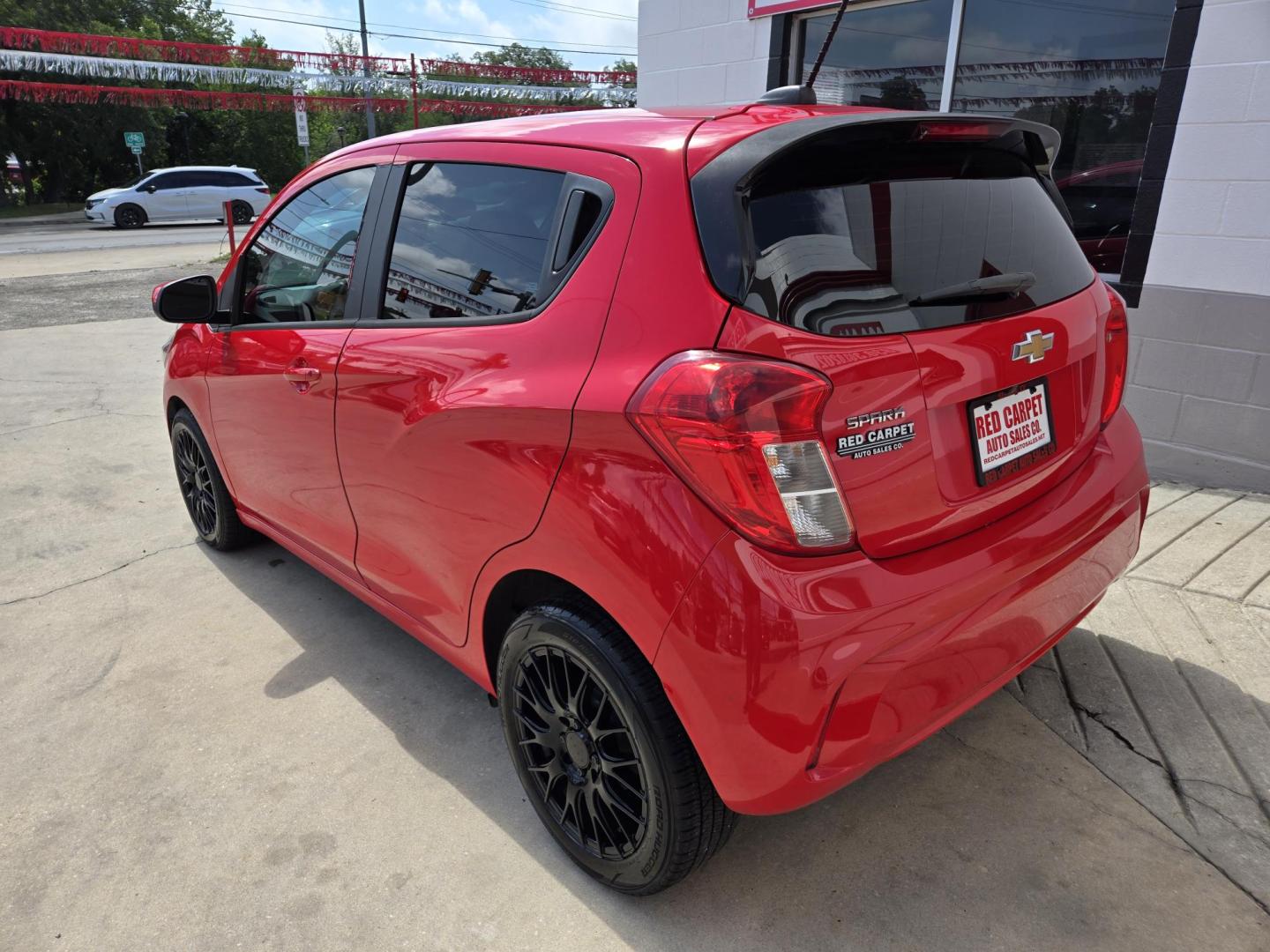 2016 Red Chevrolet Spark 1LT CVT (KL8CD6SA8GC) with an 1.4L L4 16V DOHC engine, CVT transmission, located at 503 West Court, Seguin, TX, 78155, (830) 379-3373, 29.568621, -97.969803 - Photo#3