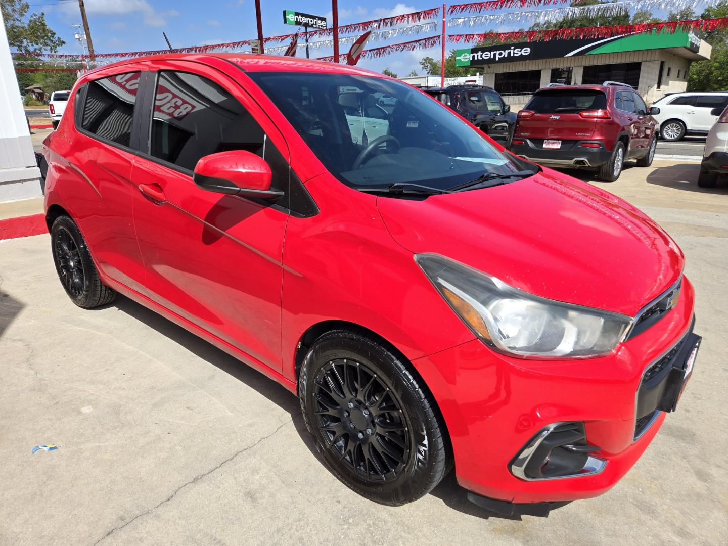 2016 Red Chevrolet Spark 1LT CVT (KL8CD6SA8GC) with an 1.4L L4 16V DOHC engine, CVT transmission, located at 503 West Court, Seguin, TX, 78155, (830) 379-3373, 29.568621, -97.969803 - 2016 Chevrolet Spark LT with a 1.4L L4 16V DOHC, Automatic, Tilt, Cruise, AM/FM/AUX Touchscreen Stereo, Power Windows, Locks and Side Mirrors, Bluetooth, Onstar Capability, Automatic Headlights, Backup Camera, Rear Wiper, Rear Defroster and more!!- Photo#1