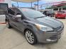2015 GRAY Ford Escape SE 4WD (1FMCU9G90FU) with an 2.0L L4 DOHC 16V engine, 6-Speed Automatic transmission, located at 503 West Court, Seguin, TX, 78155, (830) 379-3373, 29.568621, -97.969803 - 2015 Ford Escape SE 4WD with a 2.0L L4 DOHC 16V, Automatic, Tilt, Cruise, AM/FM/CD Touchscreen Stereo, Power Windows, Locks, Seat and Side Mirrors, Bluetooth, Dual Climate Control, Rear A/C, Tinted Windows, Backup Camera, Bumper Sensors, Alloy Wheels, Rear Wiper, Rear Defroster and more!! - Photo#1