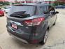 2015 GRAY Ford Escape SE 4WD (1FMCU9G90FU) with an 2.0L L4 DOHC 16V engine, 6-Speed Automatic transmission, located at 503 West Court, Seguin, TX, 78155, (830) 379-3373, 29.568621, -97.969803 - 2015 Ford Escape SE 4WD with a 2.0L L4 DOHC 16V, Automatic, Tilt, Cruise, AM/FM/CD Touchscreen Stereo, Power Windows, Locks, Seat and Side Mirrors, Bluetooth, Dual Climate Control, Rear A/C, Tinted Windows, Backup Camera, Bumper Sensors, Alloy Wheels, Rear Wiper, Rear Defroster and more!! - Photo#2