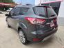 2015 GRAY Ford Escape SE 4WD (1FMCU9G90FU) with an 2.0L L4 DOHC 16V engine, 6-Speed Automatic transmission, located at 503 West Court, Seguin, TX, 78155, (830) 379-3373, 29.568621, -97.969803 - 2015 Ford Escape SE 4WD with a 2.0L L4 DOHC 16V, Automatic, Tilt, Cruise, AM/FM/CD Touchscreen Stereo, Power Windows, Locks, Seat and Side Mirrors, Bluetooth, Dual Climate Control, Rear A/C, Tinted Windows, Backup Camera, Bumper Sensors, Alloy Wheels, Rear Wiper, Rear Defroster and more!! - Photo#3
