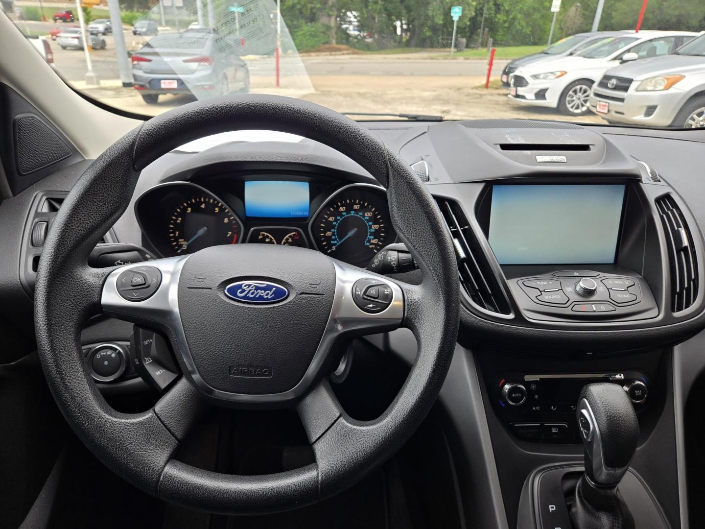 2015 GRAY Ford Escape SE 4WD (1FMCU9G90FU) with an 2.0L L4 DOHC 16V engine, 6-Speed Automatic transmission, located at 503 West Court, Seguin, TX, 78155, (830) 379-3373, 29.568621, -97.969803 - 2015 Ford Escape SE 4WD with a 2.0L L4 DOHC 16V, Automatic, Tilt, Cruise, AM/FM/CD Touchscreen Stereo, Power Windows, Locks, Seat and Side Mirrors, Bluetooth, Dual Climate Control, Rear A/C, Tinted Windows, Backup Camera, Bumper Sensors, Alloy Wheels, Rear Wiper, Rear Defroster and more!! - Photo#5