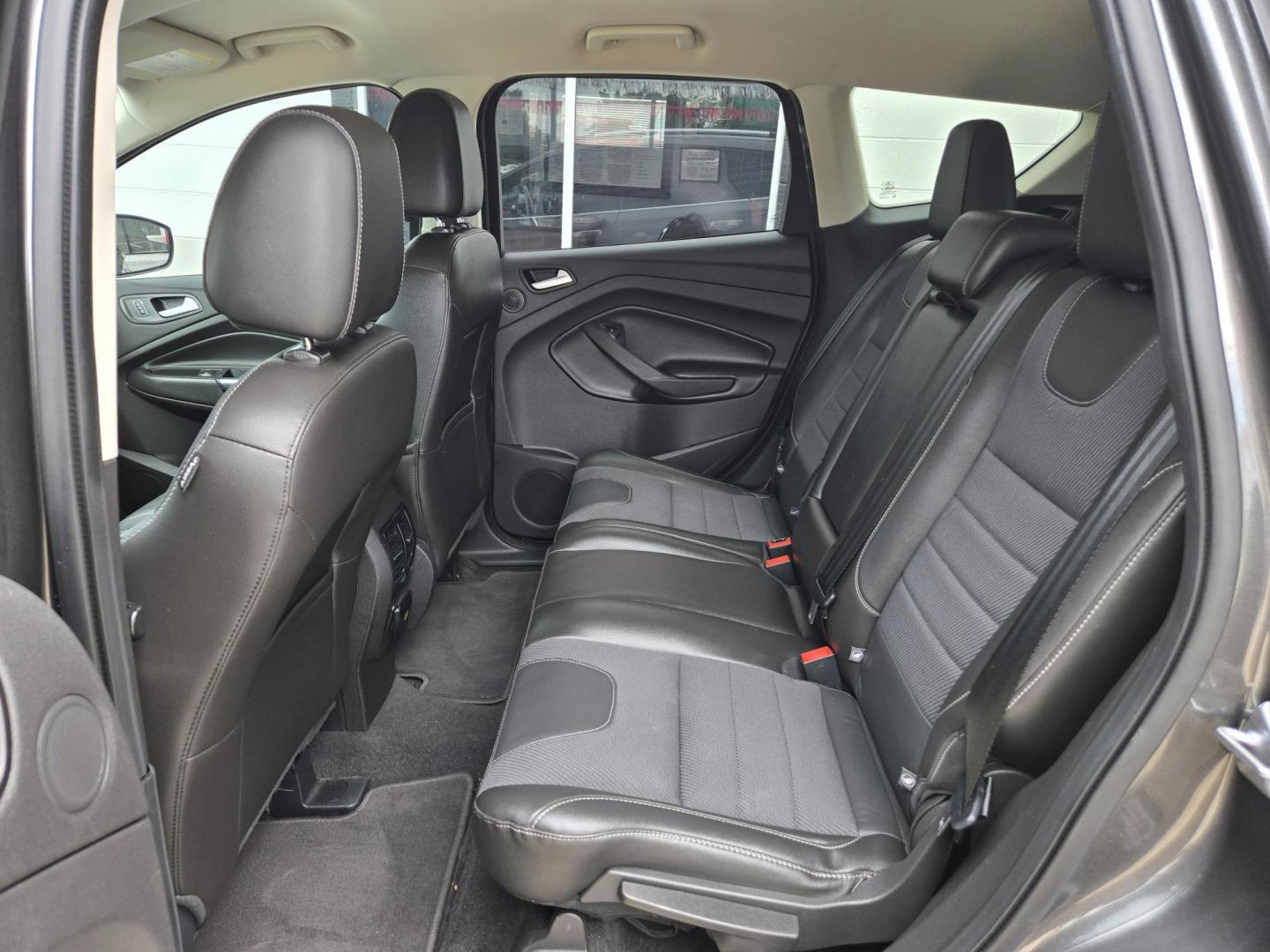 2015 GRAY Ford Escape SE 4WD (1FMCU9G90FU) with an 2.0L L4 DOHC 16V engine, 6-Speed Automatic transmission, located at 503 West Court, Seguin, TX, 78155, (830) 379-3373, 29.568621, -97.969803 - 2015 Ford Escape SE 4WD with a 2.0L L4 DOHC 16V, Automatic, Tilt, Cruise, AM/FM/CD Touchscreen Stereo, Power Windows, Locks, Seat and Side Mirrors, Bluetooth, Dual Climate Control, Rear A/C, Tinted Windows, Backup Camera, Bumper Sensors, Alloy Wheels, Rear Wiper, Rear Defroster and more!! - Photo#6