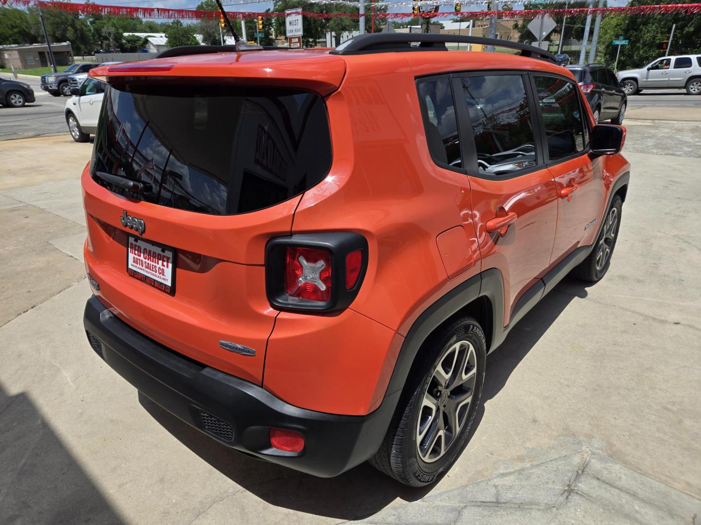 2016 Orange Jeep Renegade Latitude FWD (ZACCJABT1GP) with an 2.4L L4 DOHC 16V engine, Automatic transmission, located at 503 West Court, Seguin, TX, 78155, (830) 379-3373, 29.568621, -97.969803 - 2016 Jeep Renegade Latitude FWD with a 2.4L L4 DOHC 16V, Automatic, Tilt, Cruise, AM/FM/AUX Touchscreen Stereo, Power Windows, Locks, Seat and Side Mirrors, Bluetooth, Dual Climate Control, Automatic Headlights, Backup Camera, Alloy Wheels, Rear Wiper, Rear Defroster and more!! - Photo#2