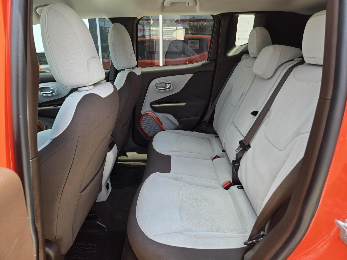 2016 Orange Jeep Renegade Latitude FWD (ZACCJABT1GP) with an 2.4L L4 DOHC 16V engine, Automatic transmission, located at 503 West Court, Seguin, TX, 78155, (830) 379-3373, 29.568621, -97.969803 - 2016 Jeep Renegade Latitude FWD with a 2.4L L4 DOHC 16V, Automatic, Tilt, Cruise, AM/FM/AUX Touchscreen Stereo, Power Windows, Locks, Seat and Side Mirrors, Bluetooth, Dual Climate Control, Automatic Headlights, Backup Camera, Alloy Wheels, Rear Wiper, Rear Defroster and more!! - Photo#6