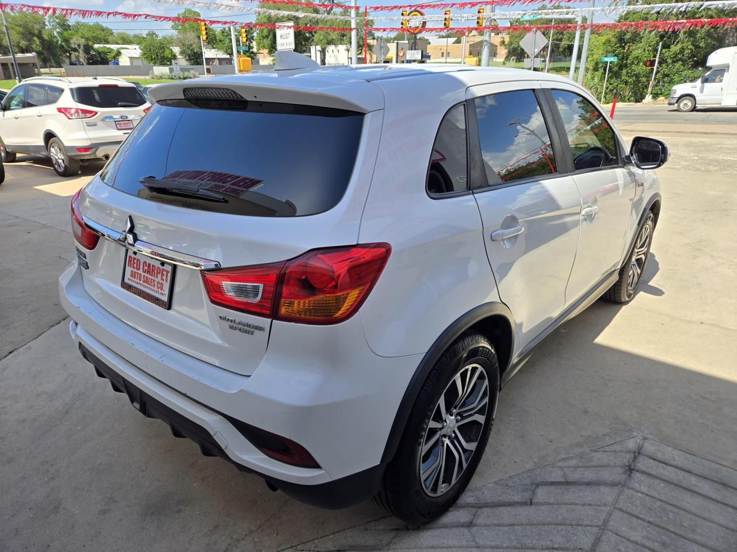 2018 WHITE Mitsubishi Outlander Sport 2.0 ES CVT (JA4AP3AUXJZ) with an 2.0L L4 DOHC 16V engine, CVT transmission, located at 503 West Court, Seguin, TX, 78155, (830) 379-3373, 29.568621, -97.969803 - 2018 Mitsubishi Outlander Sport ES with a 2.0L L4 DOHC 16V, Automatic, Tilt, Cruise, AM/FM Touchscreen Stereo, Power Windows, Locks and Side Mirrors, Bluetooth, Tinted Windows, Backup Camera, Alloy Wheels, Rear Wiper, Rear Defroster and more!! - Photo#2