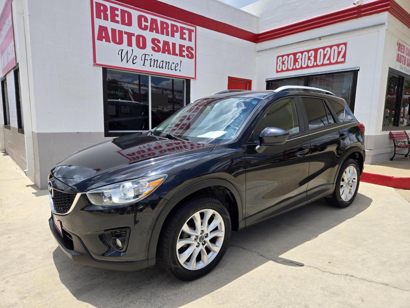 2013 Black Mazda CX-5 Grand Touring (JM3KE2DE9D0) with an 2.0L I4 F DOHC 16V engine, 6-Speed Automatic transmission, located at 503 West Court, Seguin, TX, 78155, (830) 379-3373, 29.568621, -97.969803 - 2013 Mazda CX-5 Grand Touring with a 2.0L I4 F DOHC 16V, Automatic, Tilt, Cruise, AM/FM/CD Touchscreen Stereo, Power Windows, Locks, Seat and Side Mirrors, Bluetooth, Leather Seating, Power Sunroof, Dual Climate Control, Heated Seats, Navigation System, Alloy Wheels, Backup Camera, Rear Wiper, Rear - Photo#0