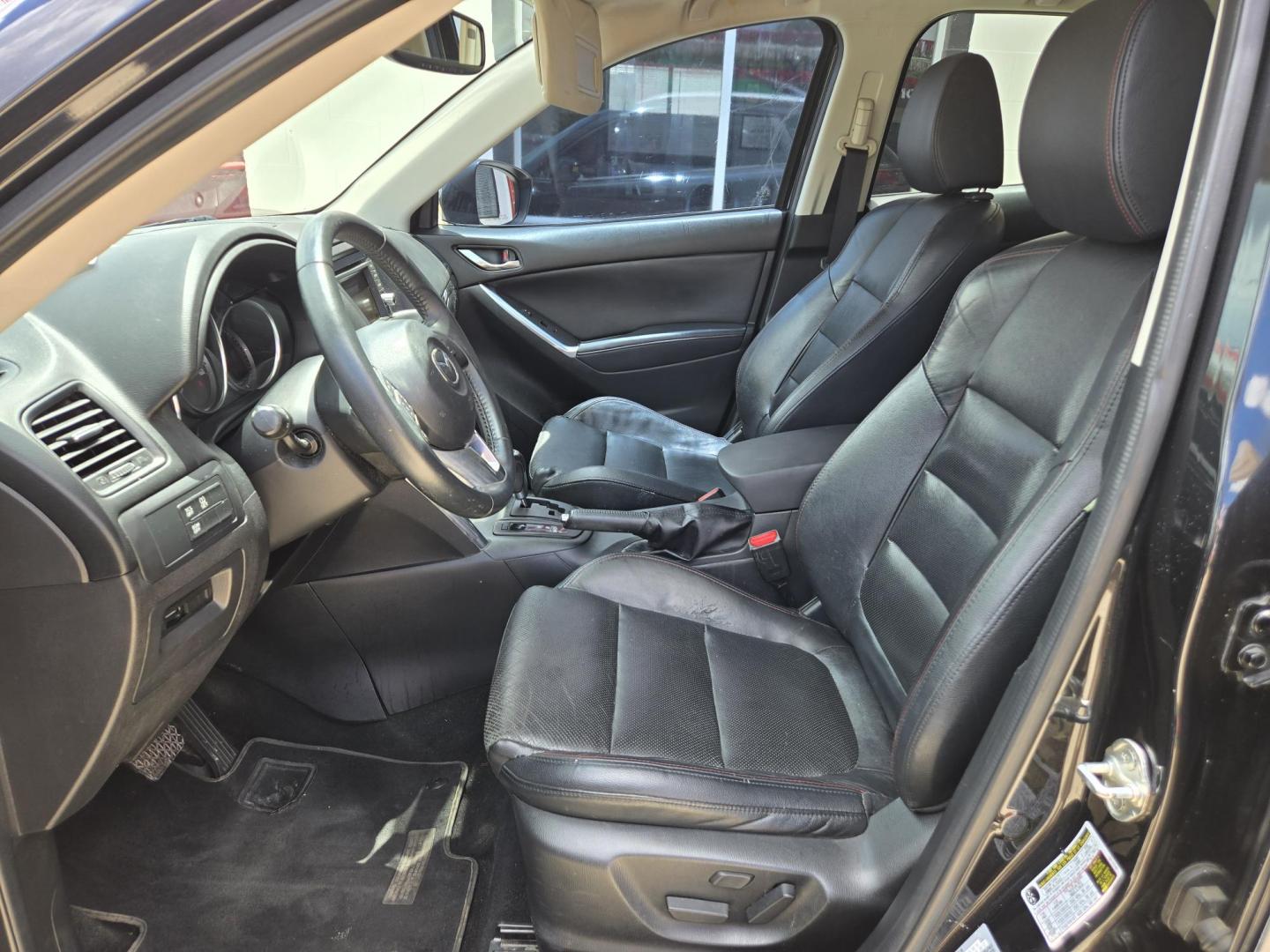 2013 Black Mazda CX-5 Grand Touring (JM3KE2DE9D0) with an 2.0L I4 F DOHC 16V engine, 6-Speed Automatic transmission, located at 503 West Court, Seguin, TX, 78155, (830) 379-3373, 29.568621, -97.969803 - 2013 Mazda CX-5 Grand Touring with a 2.0L I4 F DOHC 16V, Automatic, Tilt, Cruise, AM/FM/CD Touchscreen Stereo, Power Windows, Locks, Seat and Side Mirrors, Bluetooth, Leather Seating, Power Sunroof, Dual Climate Control, Heated Seats, Navigation System, Alloy Wheels, Backup Camera, Rear Wiper, Rear - Photo#4