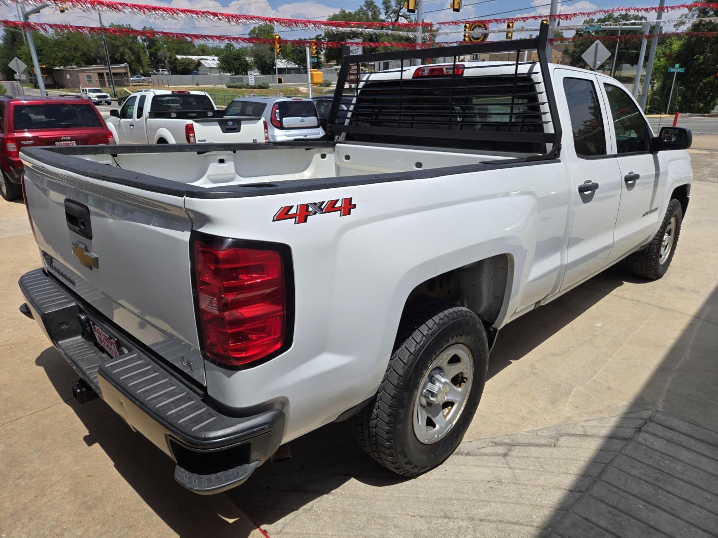 2019 WHITE Chevrolet Silverado 1500 Work Truck Double Cab 4WD (2GCVKNEC7K1) with an 5.3L V8 OHV 16V engine, 6A transmission, located at 503 West Court, Seguin, TX, 78155, (830) 379-3373, 29.568621, -97.969803 - 2019 Chevrolet Silverado 1500 Work Truck Double Cab 4WD with a 5.3L V8 OHV 16V, Automatic, Tilt, Cruise, AM/FM Touchscreen Stereo, Power Windows, Locks and Side Mirrors, Bluetooth, Automatic Headlights, Headache Rack, Onstar Capability, Trailer Towing, Backup Camera, Alloy Wheels and more!! - Photo#2