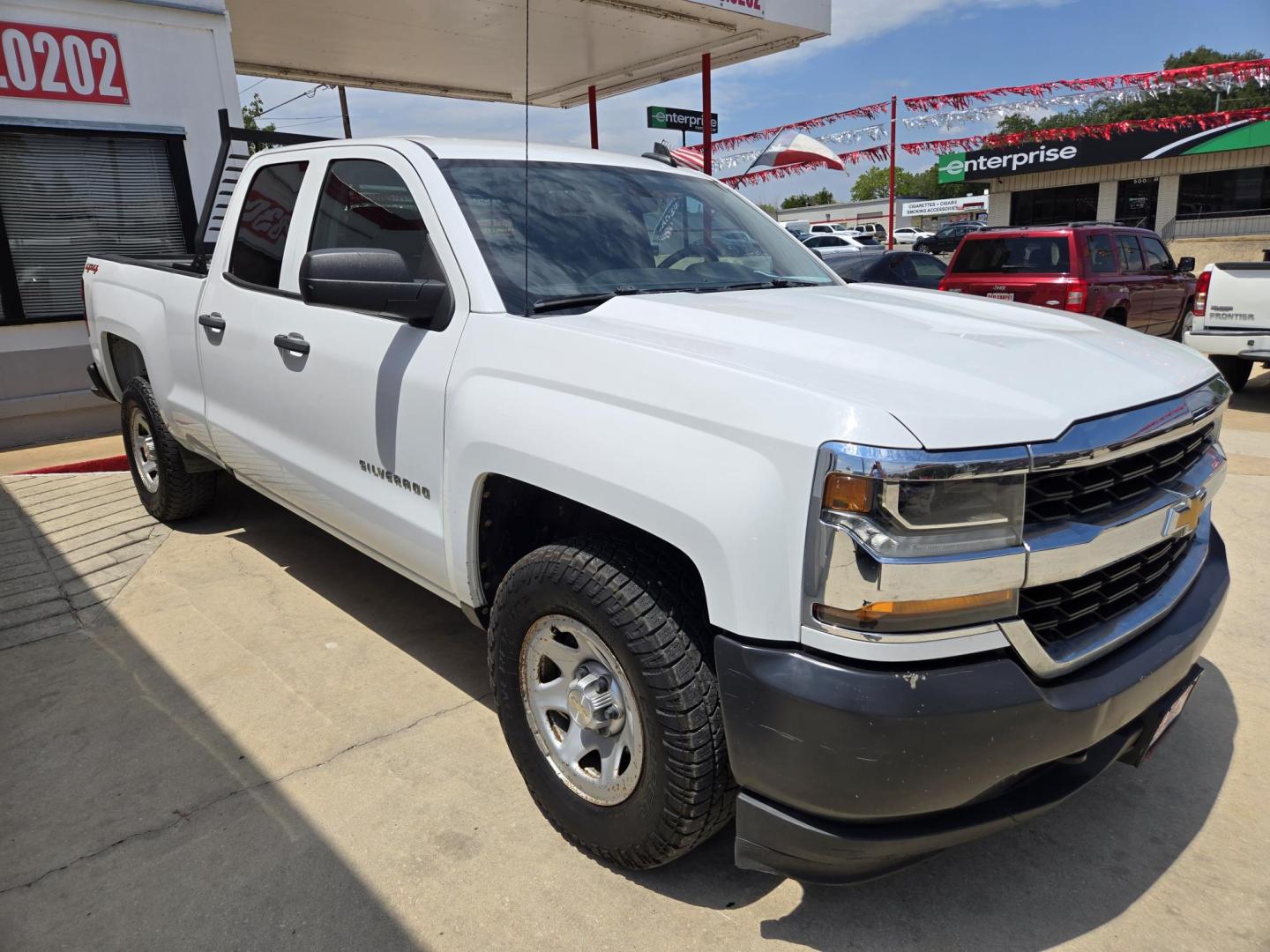 2019 WHITE Chevrolet Silverado 1500 Work Truck Double Cab 4WD (2GCVKNEC7K1) with an 5.3L V8 OHV 16V engine, 6A transmission, located at 503 West Court, Seguin, TX, 78155, (830) 379-3373, 29.568621, -97.969803 - 2019 Chevrolet Silverado 1500 Work Truck Double Cab 4WD with a 5.3L V8 OHV 16V, Automatic, Tilt, Cruise, AM/FM Touchscreen Stereo, Power Windows, Locks and Side Mirrors, Bluetooth, Automatic Headlights, Headache Rack, Onstar Capability, Trailer Towing, Backup Camera, Alloy Wheels and more!! - Photo#1
