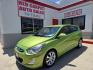 2013 Green Hyundai Accent SE 5-Door (KMHCU5AE3DU) with an 1.6L L4 DOHC 16V engine, Automatic transmission, located at 503 West Court, Seguin, TX, 78155, (830) 379-3373, 29.568621, -97.969803 - A Mean Green Machine! 2013 Hyundai Accent SE 5-Door with a 1.6L L4 DOHC 16V, Automatic, Tilt, Cruise, AM/FM/CD/AUX Stereo, Power Windows, Locks and Side Mirrors, Bluetooth, Alloy Wheels, Rear Wiper, Rear Defroster and more!! - Photo#0