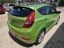2013 Green Hyundai Accent SE 5-Door (KMHCU5AE3DU) with an 1.6L L4 DOHC 16V engine, Automatic transmission, located at 503 West Court, Seguin, TX, 78155, (830) 379-3373, 29.568621, -97.969803 - A Mean Green Machine! 2013 Hyundai Accent SE 5-Door with a 1.6L L4 DOHC 16V, Automatic, Tilt, Cruise, AM/FM/CD/AUX Stereo, Power Windows, Locks and Side Mirrors, Bluetooth, Alloy Wheels, Rear Wiper, Rear Defroster and more!! - Photo#2
