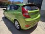 2013 Green Hyundai Accent SE 5-Door (KMHCU5AE3DU) with an 1.6L L4 DOHC 16V engine, Automatic transmission, located at 503 West Court, Seguin, TX, 78155, (830) 379-3373, 29.568621, -97.969803 - A Mean Green Machine! 2013 Hyundai Accent SE 5-Door with a 1.6L L4 DOHC 16V, Automatic, Tilt, Cruise, AM/FM/CD/AUX Stereo, Power Windows, Locks and Side Mirrors, Bluetooth, Alloy Wheels, Rear Wiper, Rear Defroster and more!! - Photo#3
