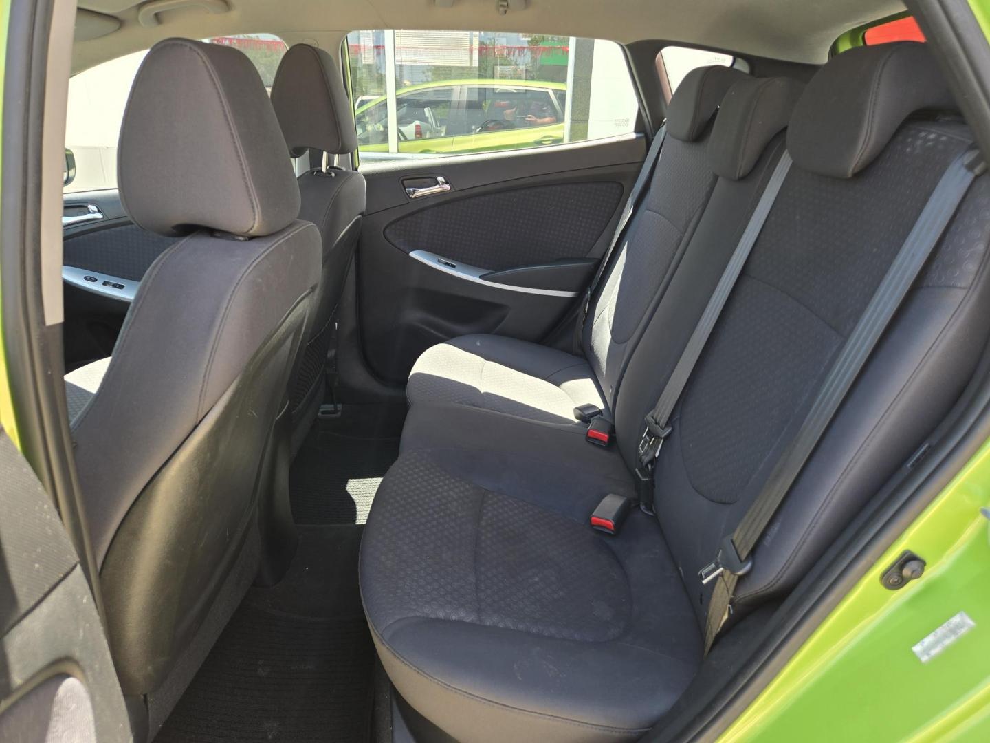 2013 Green Hyundai Accent SE 5-Door (KMHCU5AE3DU) with an 1.6L L4 DOHC 16V engine, Automatic transmission, located at 503 West Court, Seguin, TX, 78155, (830) 379-3373, 29.568621, -97.969803 - A Mean Green Machine! 2013 Hyundai Accent SE 5-Door with a 1.6L L4 DOHC 16V, Automatic, Tilt, Cruise, AM/FM/CD/AUX Stereo, Power Windows, Locks and Side Mirrors, Bluetooth, Alloy Wheels, Rear Wiper, Rear Defroster and more!! - Photo#6