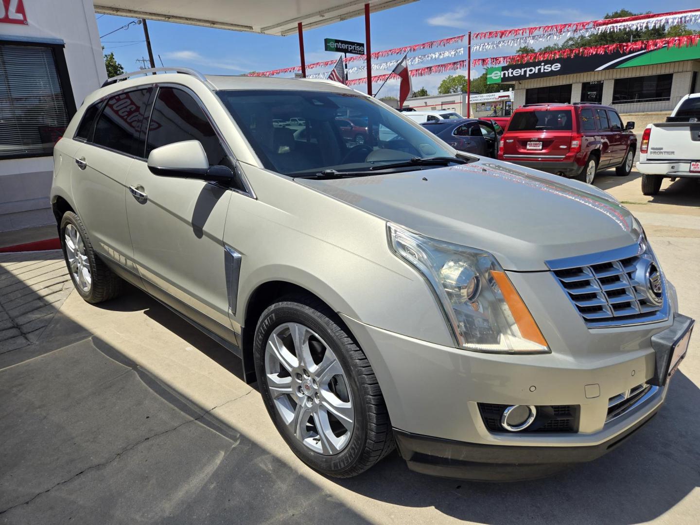 2015 Gold Cadillac SRX Performance Collection FWD (3GYFNCE38FS) with an 3.6L V6 DOHC 24V FFV engine, 6-Speed Automatic transmission, located at 503 West Court, Seguin, TX, 78155, (830) 379-3373, 29.568621, -97.969803 - 2015 Cadillac SRX Performance Collection FWD with a 3.6L V6 DOHC 24V FFV, Automatic, Tilt, Cruise, AM/FM/CD Touchscreen Stereo, Power Windows, Locks, Seat and Side Mirrors, Bluetooth, Leather Seating, Heated Seats, Dual Climate Control, Rear A/C, Tinted Windows, Power Sunroof, Rear Power Hatch, Allo - Photo#1