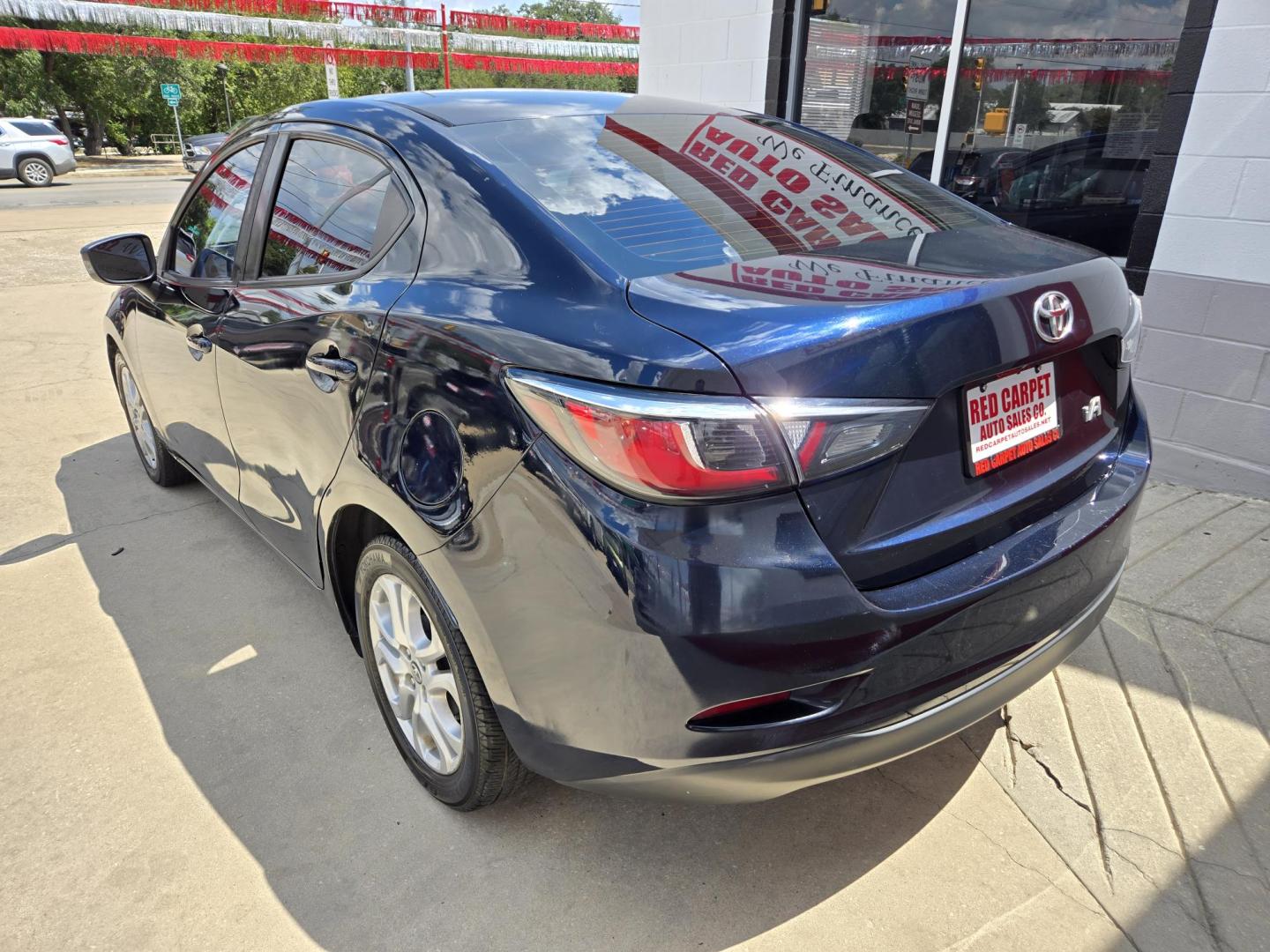 2017 BLUE Toyota Yaris iA (3MYDLBYV0HY) with an 1.5L L4 DOHC 16V engine, Automatic transmission, located at 503 West Court, Seguin, TX, 78155, (830) 379-3373, 29.568621, -97.969803 - 2017 Toyota Yaris iA with a 1.5L L4 DOHC 16V, Automatic, Tilt, Cruise, AM/FM/AUX Stereo, Power Windows, Locks and Side Mirrors, Bluetooth, Tinted Windows, Alloy Wheels, Backup Camera, Rear Defroster and more!! - Photo#3