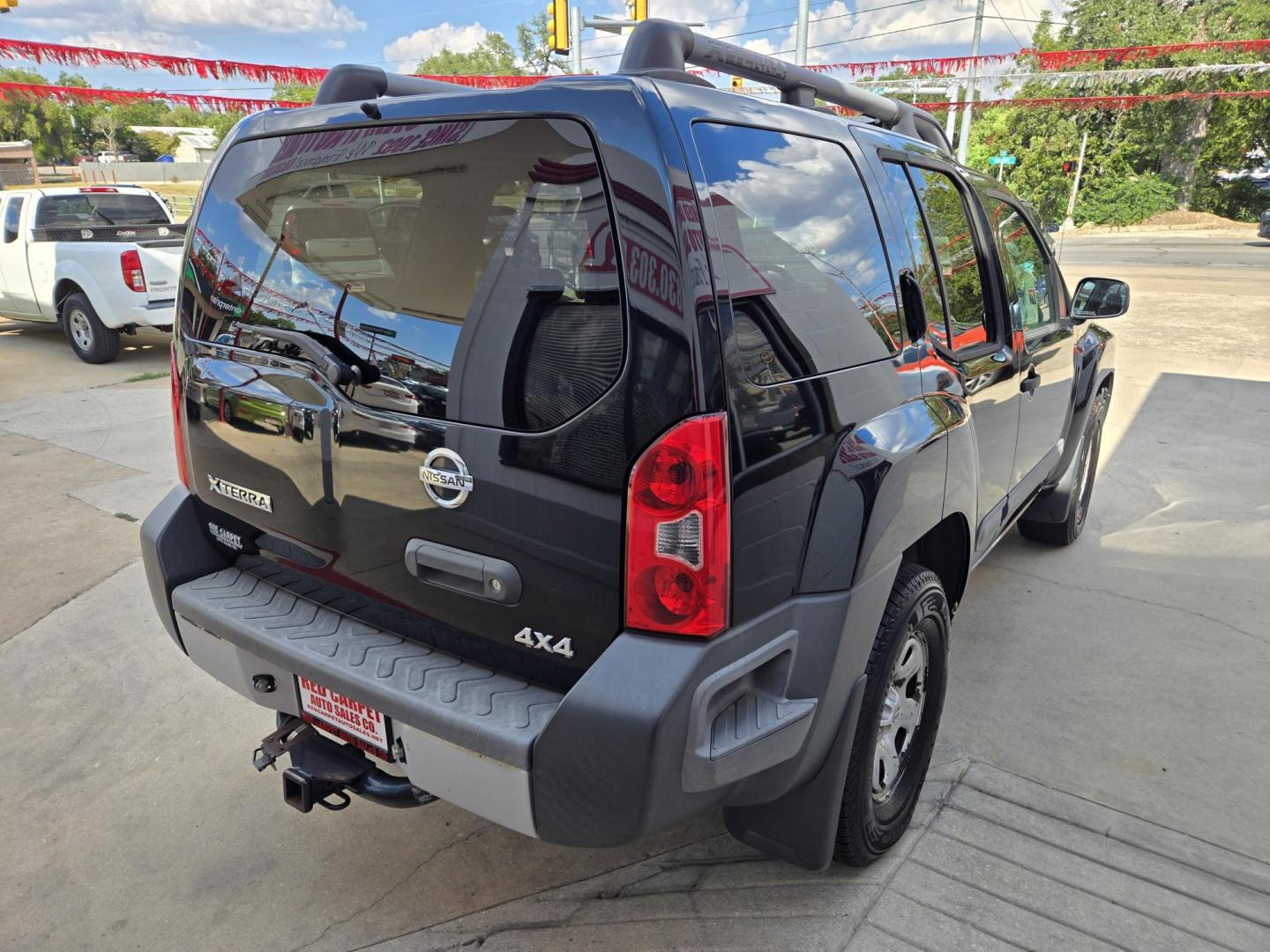 2009 Black Nissan Xterra Off-Road 4WD (5N1AN08W69C) with an 4.0L V6 DOHC 24V engine, Automatic transmission, located at 503 West Court, Seguin, TX, 78155, (830) 379-3373, 29.568621, -97.969803 - 2009 Nissan Xterra X Off-Road 4WD with a 4.0L V6 DOHC 24V, Automatic, Tilt, Cruise, AM/FM/AUX Stereo, Power Windows, Locks and Side Mirrors, Tinted Windows, Trailer Towing, Rear Wiper, Rear Defroster and more!! - Photo#2