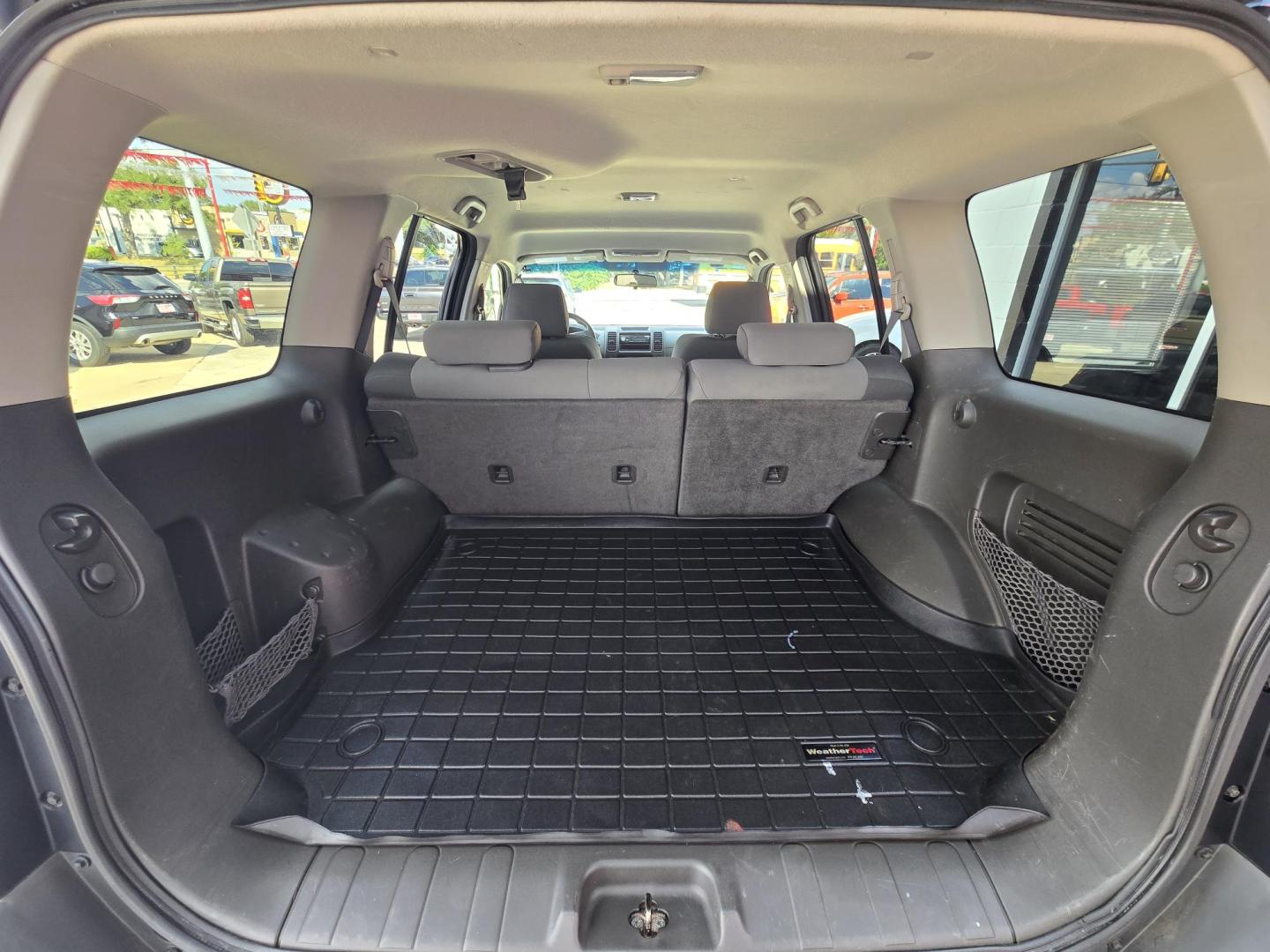 2009 Black Nissan Xterra Off-Road 4WD (5N1AN08W69C) with an 4.0L V6 DOHC 24V engine, Automatic transmission, located at 503 West Court, Seguin, TX, 78155, (830) 379-3373, 29.568621, -97.969803 - 2009 Nissan Xterra X Off-Road 4WD with a 4.0L V6 DOHC 24V, Automatic, Tilt, Cruise, AM/FM/AUX Stereo, Power Windows, Locks and Side Mirrors, Tinted Windows, Trailer Towing, Rear Wiper, Rear Defroster and more!! - Photo#7