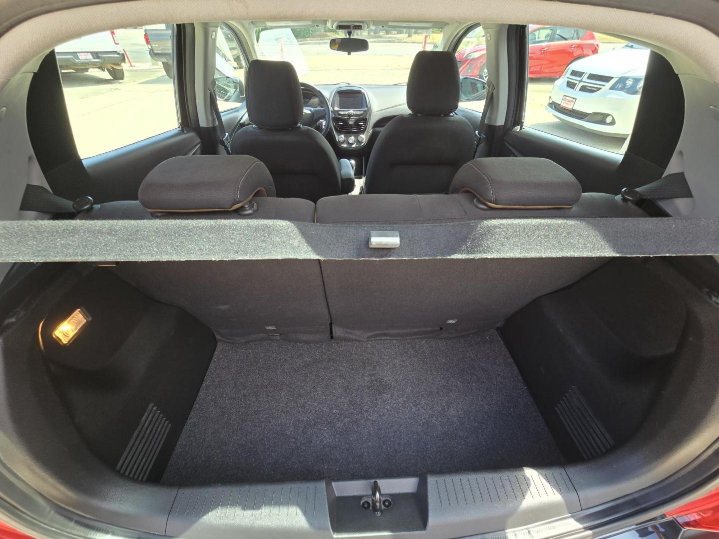 2020 Black Chevrolet Spark LS CVT (KL8CB6SA7LC) with an 1.4L L4 16V DOHC engine, CVT transmission, located at 503 West Court, Seguin, TX, 78155, (830) 379-3373, 29.568621, -97.969803 - 2020 Chevrolet Spark LS with a 1.4L L4 16V DOHC, Automatic, Tilt, AM/FM Touchscreen Stereo, Bluetooth, Automatic Headlights, Onstar Capability, Rear Wiper, Rear Defroster and more!! - Photo#7