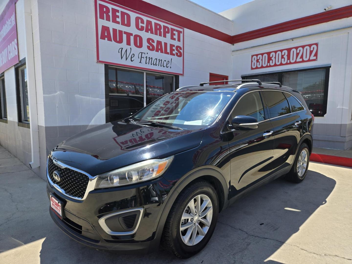 2016 Black Kia Sorento LX V6 2WD (5XYPG4A54GG) with an 3.3L V6 DOHC 24V engine, 6-Speed Automatic transmission, located at 503 West Court, Seguin, TX, 78155, (830) 379-3373, 29.568621, -97.969803 - 2016 Kia Sorento LX 2WD with a 3.3L V6 DOHC 24V, Automatic, Tilt, Cruise, AM/FM/CD/AUX Stereo, Power Windows, Locks and Side Mirrors, Bluetooth, Automatic Headlights, Rear A/C, Third Row Seating, Alloy Wheels, Backup Camera, Rear Wiper, Rear Defroster and more!! - Photo#0
