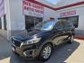 2016 Black Kia Sorento LX V6 2WD (5XYPG4A54GG) with an 3.3L V6 DOHC 24V engine, 6-Speed Automatic transmission, located at 503 West Court, Seguin, TX, 78155, (830) 379-3373, 29.568621, -97.969803 - 2016 Kia Sorento LX 2WD with a 3.3L V6 DOHC 24V, Automatic, Tilt, Cruise, AM/FM/CD/AUX Stereo, Power Windows, Locks and Side Mirrors, Bluetooth, Automatic Headlights, Rear A/C, Third Row Seating, Alloy Wheels, Backup Camera, Rear Wiper, Rear Defroster and more!! - Photo#0