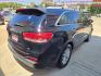 2016 Black Kia Sorento LX V6 2WD (5XYPG4A54GG) with an 3.3L V6 DOHC 24V engine, 6-Speed Automatic transmission, located at 503 West Court, Seguin, TX, 78155, (830) 379-3373, 29.568621, -97.969803 - 2016 Kia Sorento LX 2WD with a 3.3L V6 DOHC 24V, Automatic, Tilt, Cruise, AM/FM/CD/AUX Stereo, Power Windows, Locks and Side Mirrors, Bluetooth, Automatic Headlights, Rear A/C, Third Row Seating, Alloy Wheels, Backup Camera, Rear Wiper, Rear Defroster and more!! - Photo#2