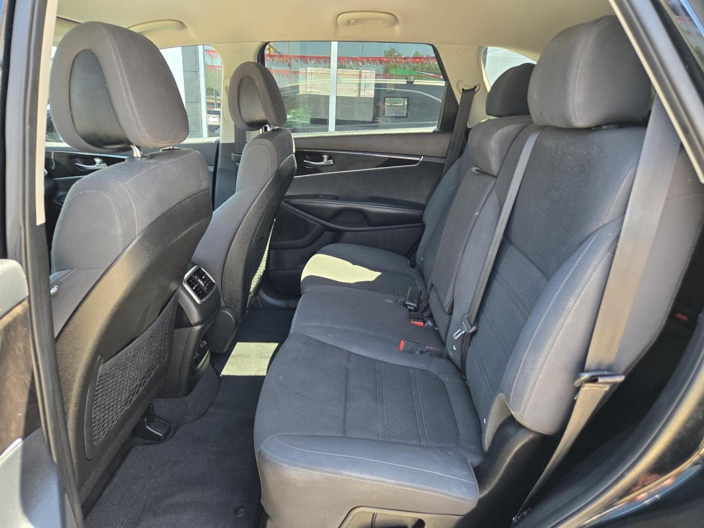 2016 Black Kia Sorento LX V6 2WD (5XYPG4A54GG) with an 3.3L V6 DOHC 24V engine, 6-Speed Automatic transmission, located at 503 West Court, Seguin, TX, 78155, (830) 379-3373, 29.568621, -97.969803 - 2016 Kia Sorento LX 2WD with a 3.3L V6 DOHC 24V, Automatic, Tilt, Cruise, AM/FM/CD/AUX Stereo, Power Windows, Locks and Side Mirrors, Bluetooth, Automatic Headlights, Rear A/C, Third Row Seating, Alloy Wheels, Backup Camera, Rear Wiper, Rear Defroster and more!! - Photo#6