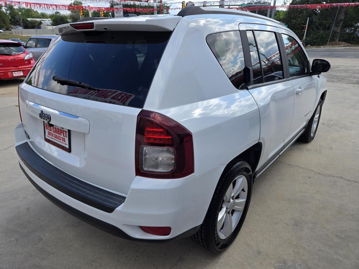2016 WHITE Jeep Compass Sport FWD (1C4NJCBAXGD) with an 2.0L L4 DOHC 16V engine, Automatic transmission, located at 503 West Court, Seguin, TX, 78155, (830) 379-3373, 29.568621, -97.969803 - 2016 Jeep Compass Sport FWD with a 2.0L L4 DOHC 16V, Automatic, Tilt, Cruise, AM/FM Touchscreen Stereo, Power Windows, Locks and Side Mirrors, Tinted Windows, Backup Camera, Alloy Wheels, Rear Wiper, Rear Defroster and more!! - Photo#2