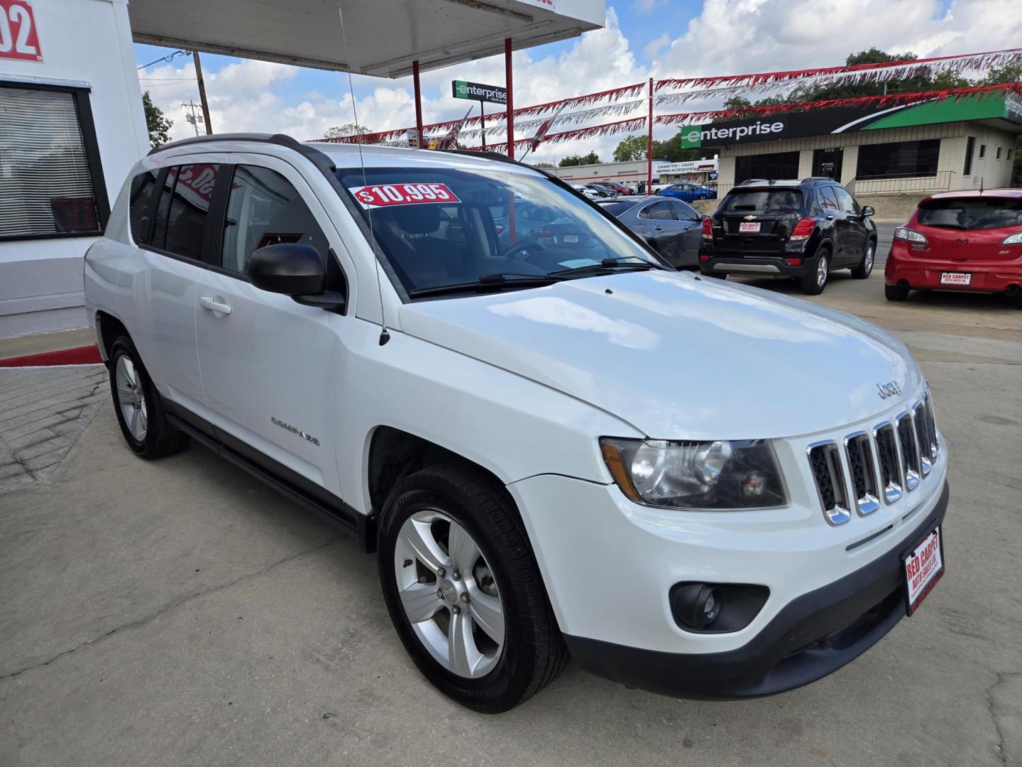2016 WHITE Jeep Compass Sport FWD (1C4NJCBAXGD) with an 2.0L L4 DOHC 16V engine, Automatic transmission, located at 503 West Court, Seguin, TX, 78155, (830) 379-3373, 29.568621, -97.969803 - 2016 Jeep Compass Sport FWD with a 2.0L L4 DOHC 16V, Automatic, Tilt, Cruise, AM/FM Touchscreen Stereo, Power Windows, Locks and Side Mirrors, Tinted Windows, Backup Camera, Alloy Wheels, Rear Wiper, Rear Defroster and more!! - Photo#1