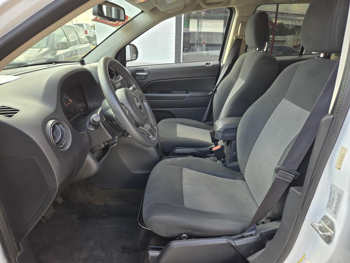 2016 WHITE Jeep Compass Sport FWD (1C4NJCBAXGD) with an 2.0L L4 DOHC 16V engine, Automatic transmission, located at 503 West Court, Seguin, TX, 78155, (830) 379-3373, 29.568621, -97.969803 - 2016 Jeep Compass Sport FWD with a 2.0L L4 DOHC 16V, Automatic, Tilt, Cruise, AM/FM Touchscreen Stereo, Power Windows, Locks and Side Mirrors, Tinted Windows, Backup Camera, Alloy Wheels, Rear Wiper, Rear Defroster and more!! - Photo#4