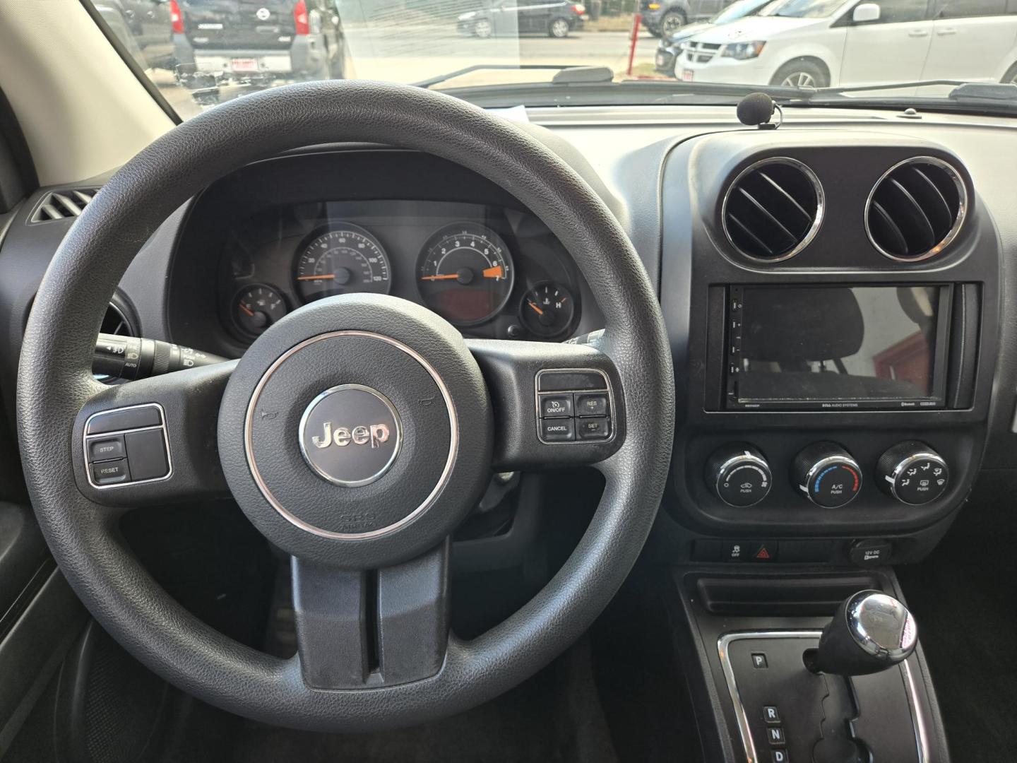 2016 WHITE Jeep Compass Sport FWD (1C4NJCBAXGD) with an 2.0L L4 DOHC 16V engine, Automatic transmission, located at 503 West Court, Seguin, TX, 78155, (830) 379-3373, 29.568621, -97.969803 - 2016 Jeep Compass Sport FWD with a 2.0L L4 DOHC 16V, Automatic, Tilt, Cruise, AM/FM Touchscreen Stereo, Power Windows, Locks and Side Mirrors, Tinted Windows, Backup Camera, Alloy Wheels, Rear Wiper, Rear Defroster and more!! - Photo#5