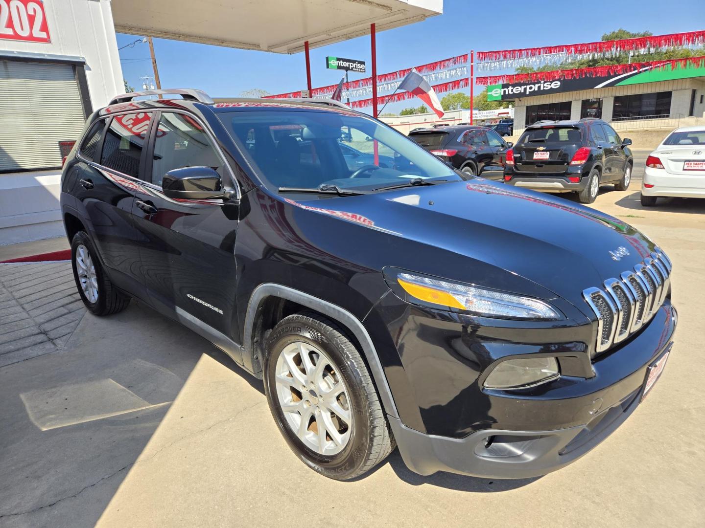 2017 Black Jeep Cherokee Latitude FWD (1C4PJLCB7HW) with an 2.4L L4 DOHC 16V engine, 9A transmission, located at 503 West Court, Seguin, TX, 78155, (830) 379-3373, 29.568621, -97.969803 - Photo#1