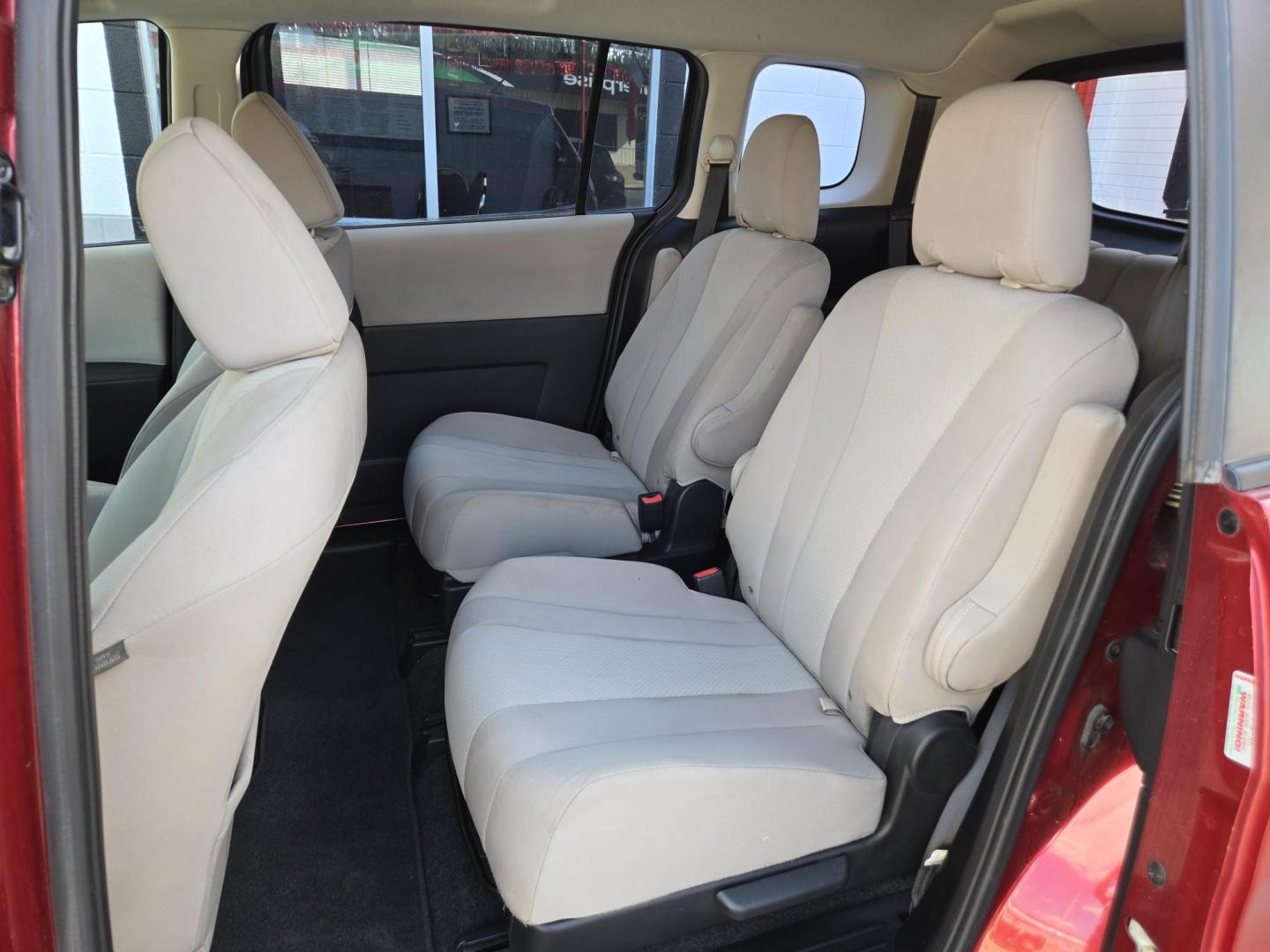2014 Red Mazda MAZDA5 Sport AT (JM1CW2BL2E0) with an 2.5L L4 DOHC 16V engine, 5-Speed Automatic transmission, located at 503 West Court, Seguin, TX, 78155, (830) 379-3373, 29.568621, -97.969803 - 2014 Mazda MAZDA5 Sport with a 2.5L L4 DOHC 16V, Automatic, Tilt, Cruise, AM/FM/CD Stereo, Power Windows, Locks and Side Mirrors, Third Row Seating, Foldable Rear Center Console, Alloy Wheels, Tinted Windows, Rear Wiper, Rear Defroster and more!! - Photo#6