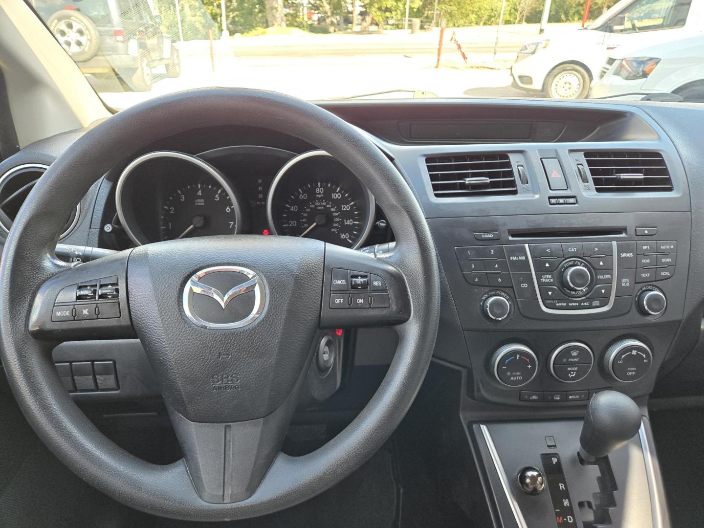 2014 Red Mazda MAZDA5 Sport AT (JM1CW2BL2E0) with an 2.5L L4 DOHC 16V engine, 5-Speed Automatic transmission, located at 503 West Court, Seguin, TX, 78155, (830) 379-3373, 29.568621, -97.969803 - 2014 Mazda MAZDA5 Sport with a 2.5L L4 DOHC 16V, Automatic, Tilt, Cruise, AM/FM/CD Stereo, Power Windows, Locks and Side Mirrors, Third Row Seating, Foldable Rear Center Console, Alloy Wheels, Tinted Windows, Rear Wiper, Rear Defroster and more!! - Photo#5