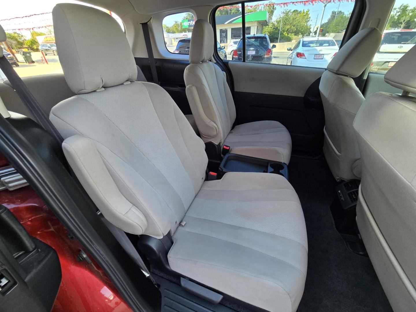 2014 Red Mazda MAZDA5 Sport AT (JM1CW2BL2E0) with an 2.5L L4 DOHC 16V engine, 5-Speed Automatic transmission, located at 503 West Court, Seguin, TX, 78155, (830) 379-3373, 29.568621, -97.969803 - 2014 Mazda MAZDA5 Sport with a 2.5L L4 DOHC 16V, Automatic, Tilt, Cruise, AM/FM/CD Stereo, Power Windows, Locks and Side Mirrors, Third Row Seating, Foldable Rear Center Console, Alloy Wheels, Tinted Windows, Rear Wiper, Rear Defroster and more!! - Photo#10