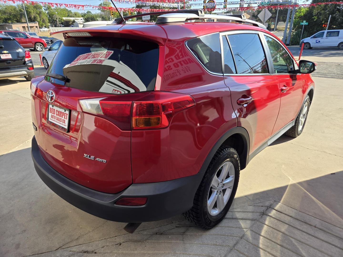 2013 Red Toyota RAV4 XLE AWD (2T3RFREV9DW) with an 2.5L L4 DOHC 16V engine, 6-Speed Automatic transmission, located at 503 West Court, Seguin, TX, 78155, (830) 379-3373, 29.568621, -97.969803 - 2013 Toyota RAV4 XLE AWD with a 2.5L L4 DOHC 16V, Automatic, Tilt, Cruise, AM/FM/CD/AUX Touchscreen Stereo, Power Windows, Locks and Side Mirrors, Bluetooth, Tinted Windows, Alloy Wheels, Power Sunroof, Backup Camera, Rear Wiper, Rear Defroster and more!! - Photo#2