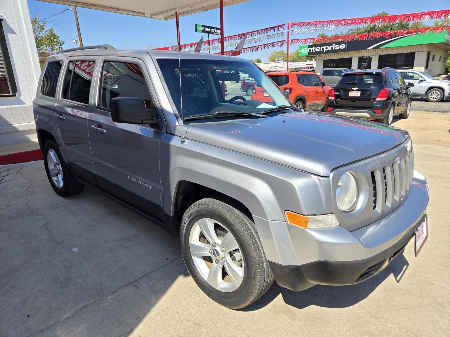 2015 SILVER Jeep Patriot Latitude 2WD (1C4NJPFB8FD) with an 2.4L L4 DOHC 16V engine, Manual Transmission transmission, located at 503 West Court, Seguin, TX, 78155, (830) 379-3373, 29.568621, -97.969803 - 2015 Jeep Patriot Latitude 2WD with a 2.4L L4 DOHC 16V, Manual Transmission, Tilt, Cruise, AM/FM/CD/AUX Touchscreen Stereo, Power Windows, Locks and Side Mirrors, Bluetooth, Heated Seats, Tinted Windows, Alloy Wheels, Rear Wiper, Rear Defroster and more!! - Photo#1