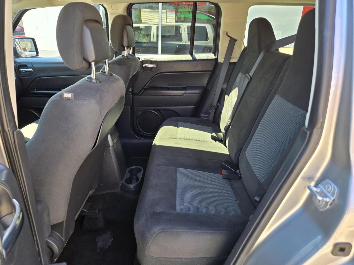 2015 SILVER Jeep Patriot Latitude 2WD (1C4NJPFB8FD) with an 2.4L L4 DOHC 16V engine, Manual Transmission transmission, located at 503 West Court, Seguin, TX, 78155, (830) 379-3373, 29.568621, -97.969803 - 2015 Jeep Patriot Latitude 2WD with a 2.4L L4 DOHC 16V, Manual Transmission, Tilt, Cruise, AM/FM/CD/AUX Touchscreen Stereo, Power Windows, Locks and Side Mirrors, Bluetooth, Heated Seats, Tinted Windows, Alloy Wheels, Rear Wiper, Rear Defroster and more!! - Photo#6