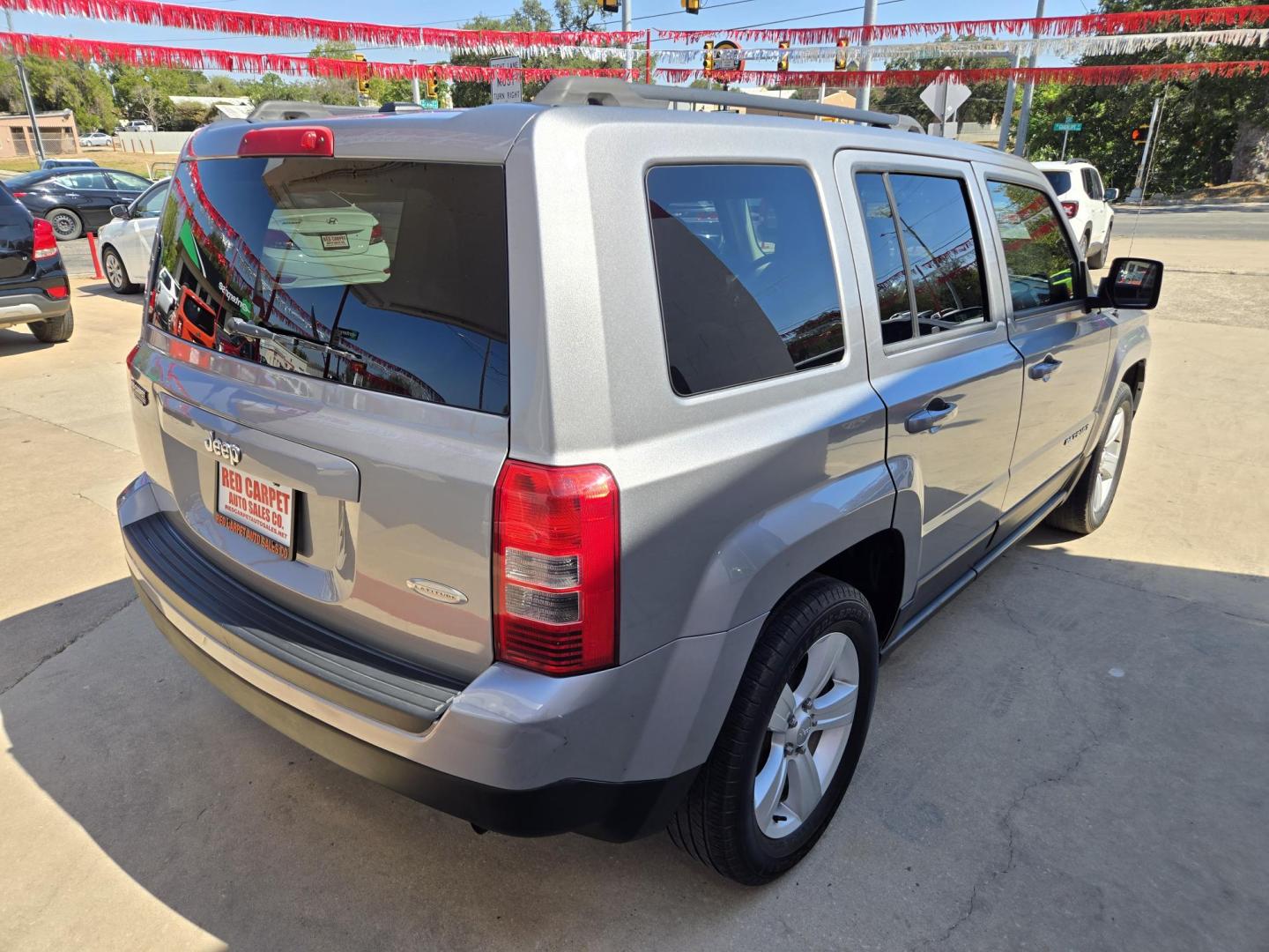 2015 SILVER Jeep Patriot Latitude 2WD (1C4NJPFB8FD) with an 2.4L L4 DOHC 16V engine, Manual Transmission transmission, located at 503 West Court, Seguin, TX, 78155, (830) 379-3373, 29.568621, -97.969803 - 2015 Jeep Patriot Latitude 2WD with a 2.4L L4 DOHC 16V, Manual Transmission, Tilt, Cruise, AM/FM/CD/AUX Touchscreen Stereo, Power Windows, Locks and Side Mirrors, Bluetooth, Heated Seats, Tinted Windows, Alloy Wheels, Rear Wiper, Rear Defroster and more!! - Photo#2