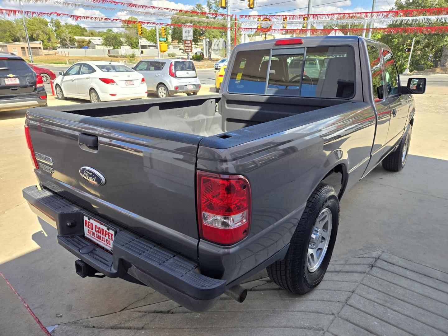 2011 GRAY Ford Ranger Sport SuperCab 4-Door 2WD (1FTKR4EE0BP) with an 4.0L V6 SOHC 12V engine, Automatic transmission, located at 503 West Court, Seguin, TX, 78155, (830) 379-3373, 29.568621, -97.969803 - Photo#2