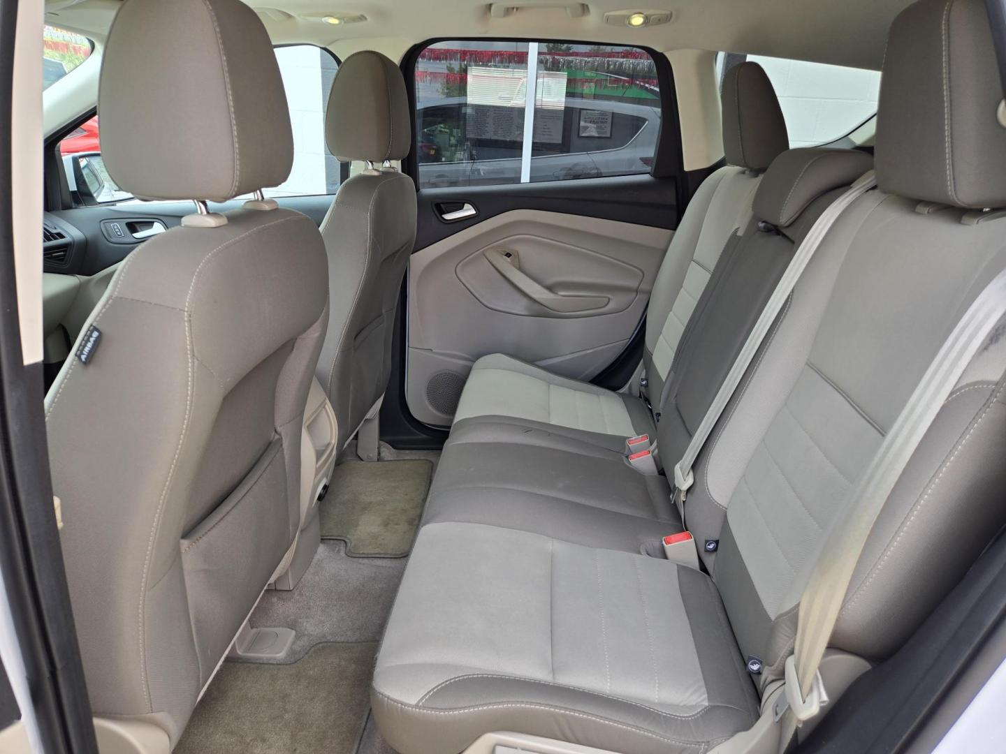 2014 WHITE Ford Escape SE FWD (1FMCU0G99EU) with an 2.0L L4 DOHC 16V engine, 6-Speed Automatic transmission, located at 503 West Court, Seguin, TX, 78155, (830) 379-3373, 29.568621, -97.969803 - 2014 Ford Escape SE FWD with a 2.0L L4 DOHC 16V, Automatic, Tilt, Cruise, AM/FM/CD Stereo, Power Windows, Locks, Seats and Side Mirrors, Bluetooth, Automatic Headlights, Power Sunroof, Alloy Wheels, Backup Camera, Rear Wiper, Rear Defroster and more!! - Photo#6