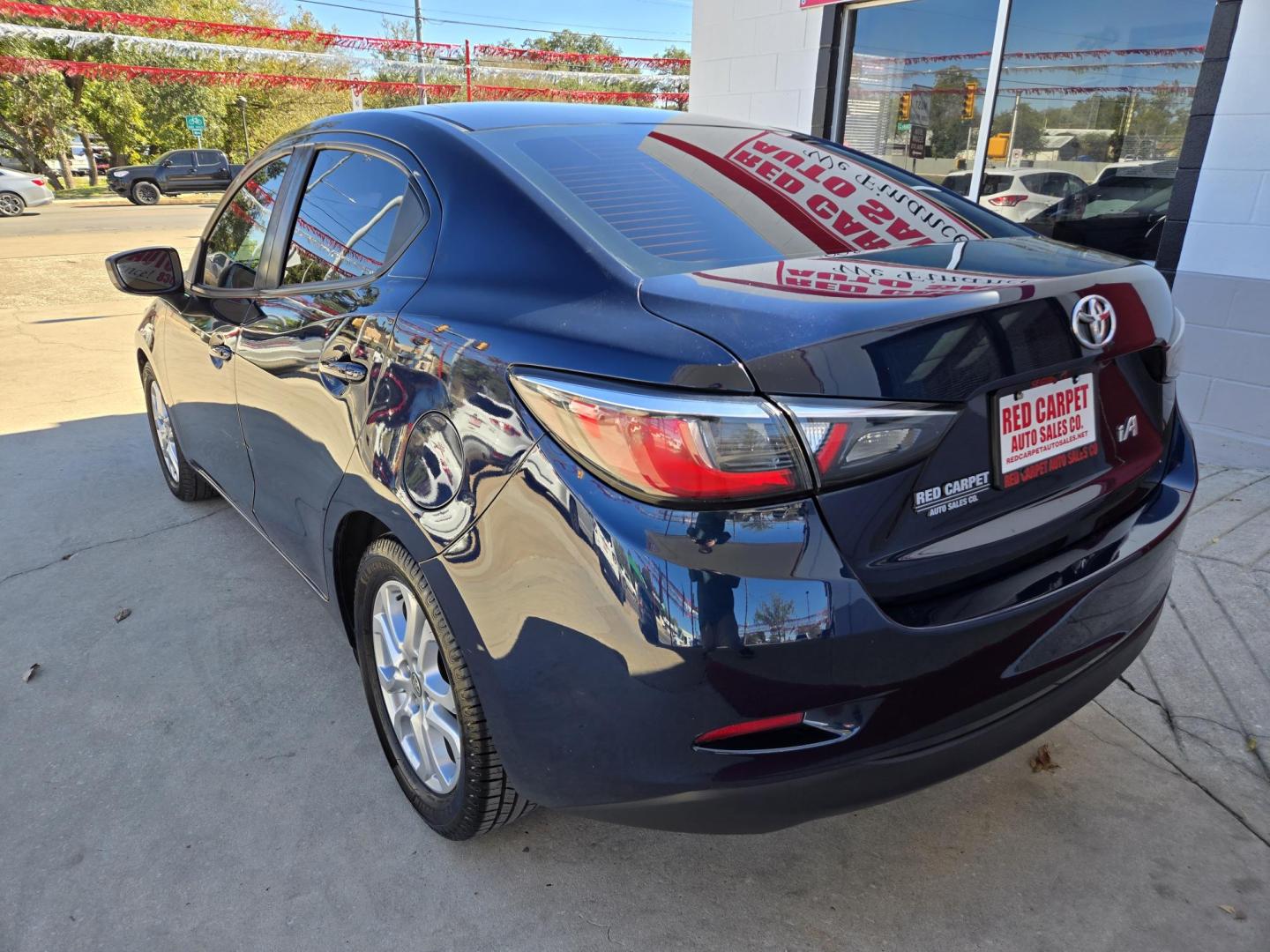 2018 Blue Toyota Yaris iA 6A (3MYDLBYV9JY) with an 1.5L L4 DOHC 16V engine, Automatic transmission, located at 503 West Court, Seguin, TX, 78155, (830) 379-3373, 29.568621, -97.969803 - 2018 Toyota Yaris iA with a 1.5L L4 DOHC 16V, Automatic, Tilt, Cruise, AM/FM Stereo, Power Windows, Locks and Side Mirrors, Bluetooth, Tinted Windows, Backup Camera, Alloy Wheels, Rear Defroster and more!! - Photo#3