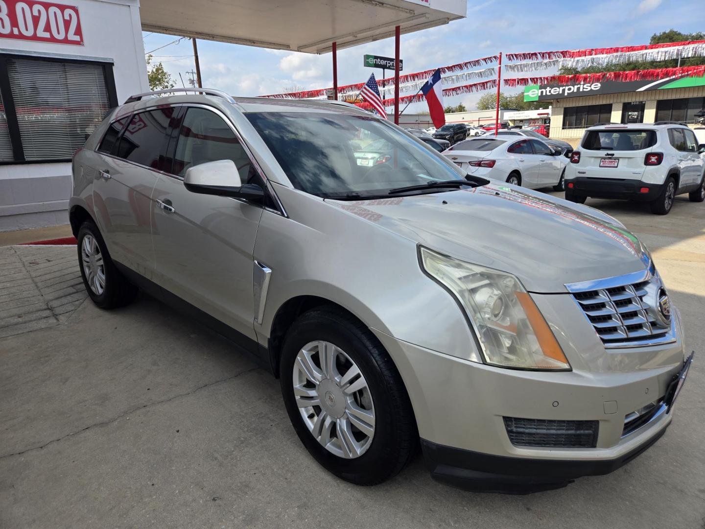 2015 GOLD Cadillac SRX Luxury Collection FWD (3GYFNBE37FS) with an 3.6L V6 DOHC 24V FFV engine, 6-Speed Automatic transmission, located at 503 West Court, Seguin, TX, 78155, (830) 379-3373, 29.568621, -97.969803 - Photo#1