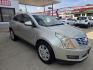 2015 GOLD Cadillac SRX Luxury Collection FWD (3GYFNBE37FS) with an 3.6L V6 DOHC 24V FFV engine, 6-Speed Automatic transmission, located at 503 West Court, Seguin, TX, 78155, (830) 379-3373, 29.568621, -97.969803 - Photo#1